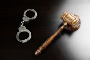 Rights of the accused represented by gavel and handcuffs